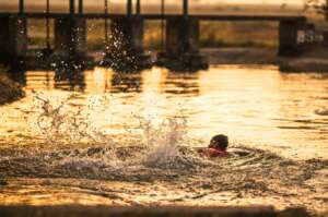 Man Swimming In the evening